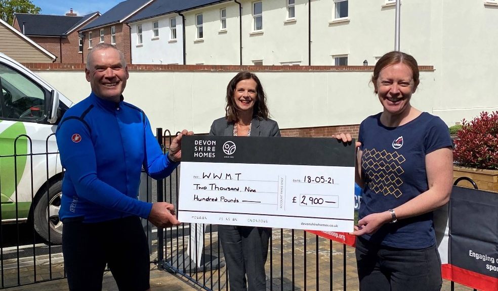 Guy Langworthy and Jane Pearce of Devonshire Homes with Sarah Perry of WWMT