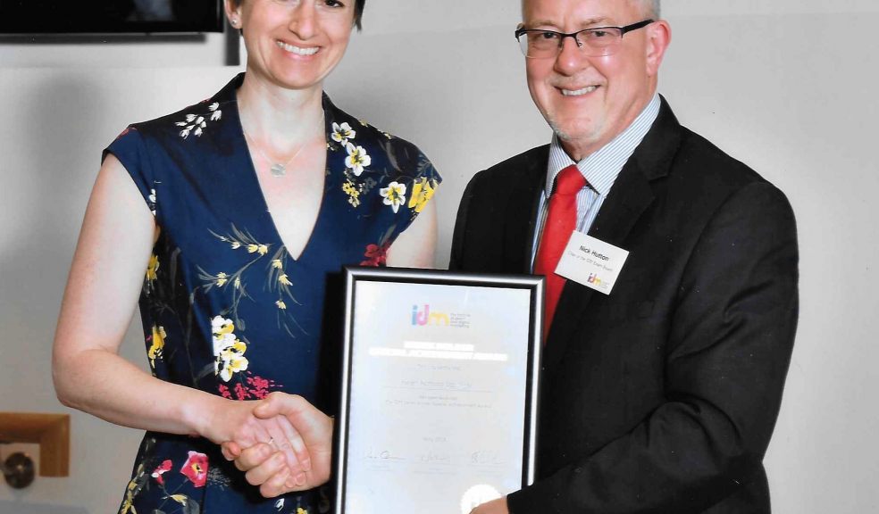Helen Nattrass is presented with her awards by Nick Hutton, chair of the IDM Exam Board