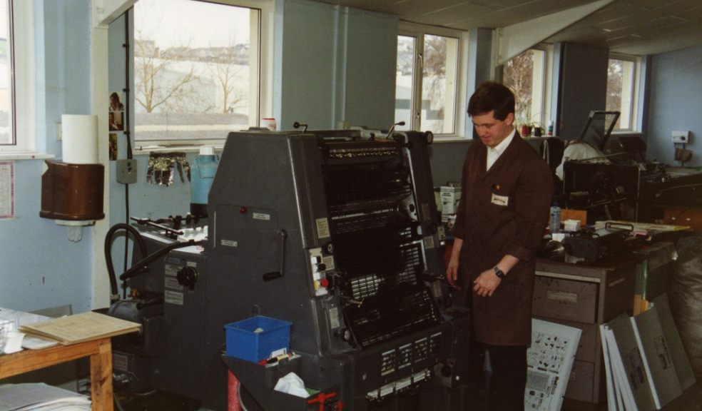 Owner Tim Besley working on the presses in the early 90