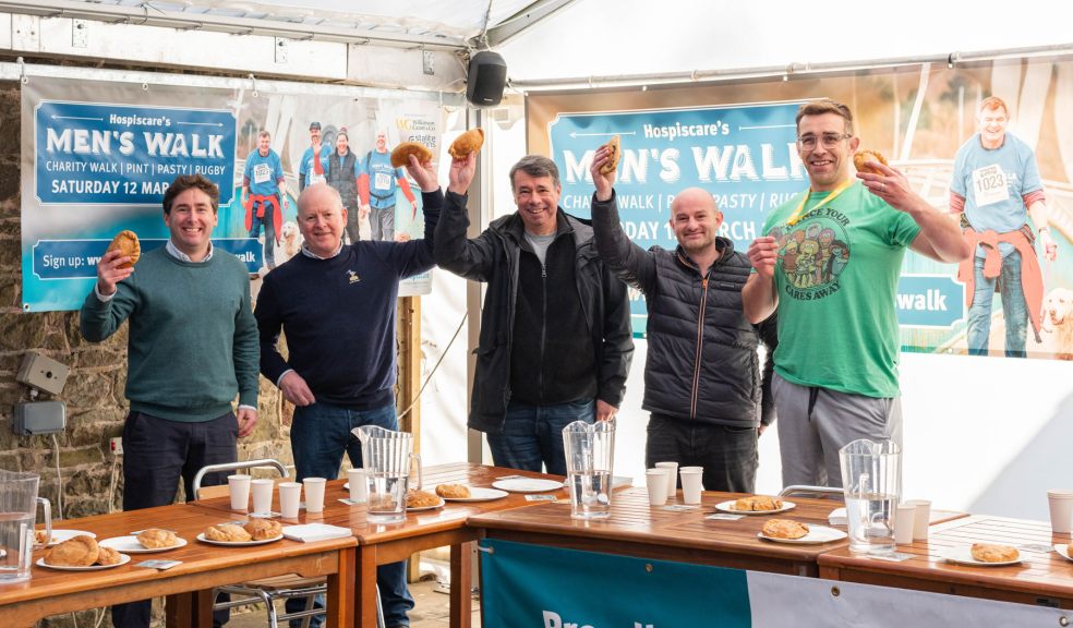 Five men holding pasties