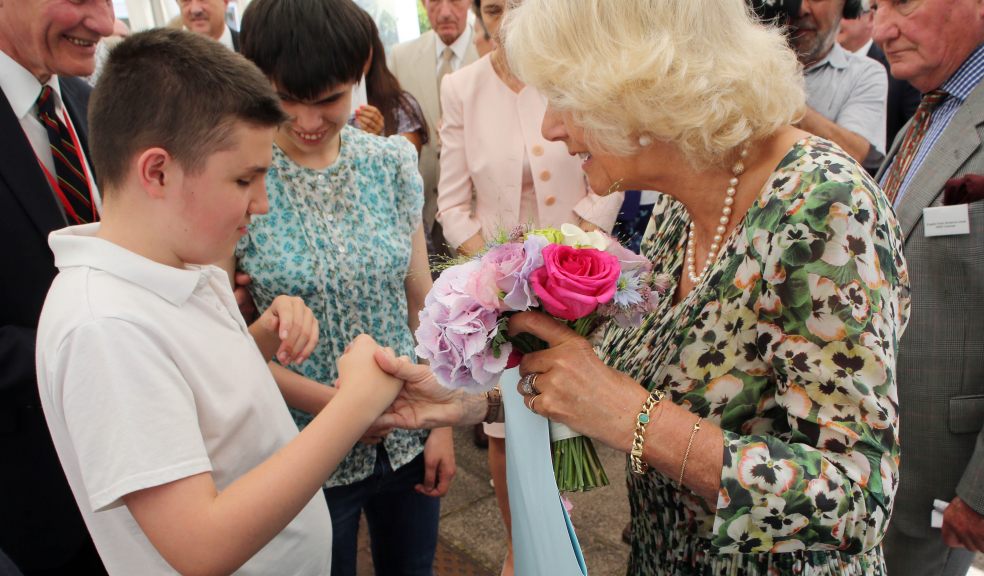 Louis and Marie presenting posy and birthday card