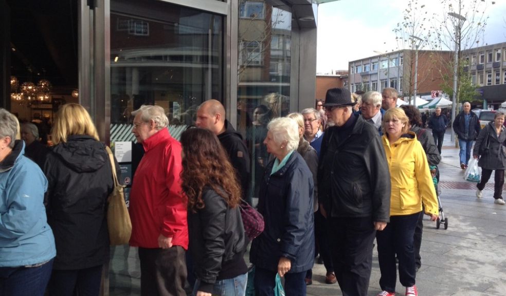 Customers lining up to shop at John Lewis