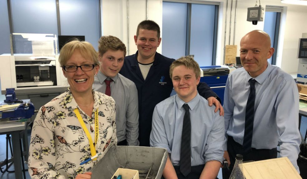 Principal Claire Plumb and Assistant Principal Paul Kennedy-Bruyneels with the team and their rescue vessel for entry to the 2019 RN Engineering challenge.