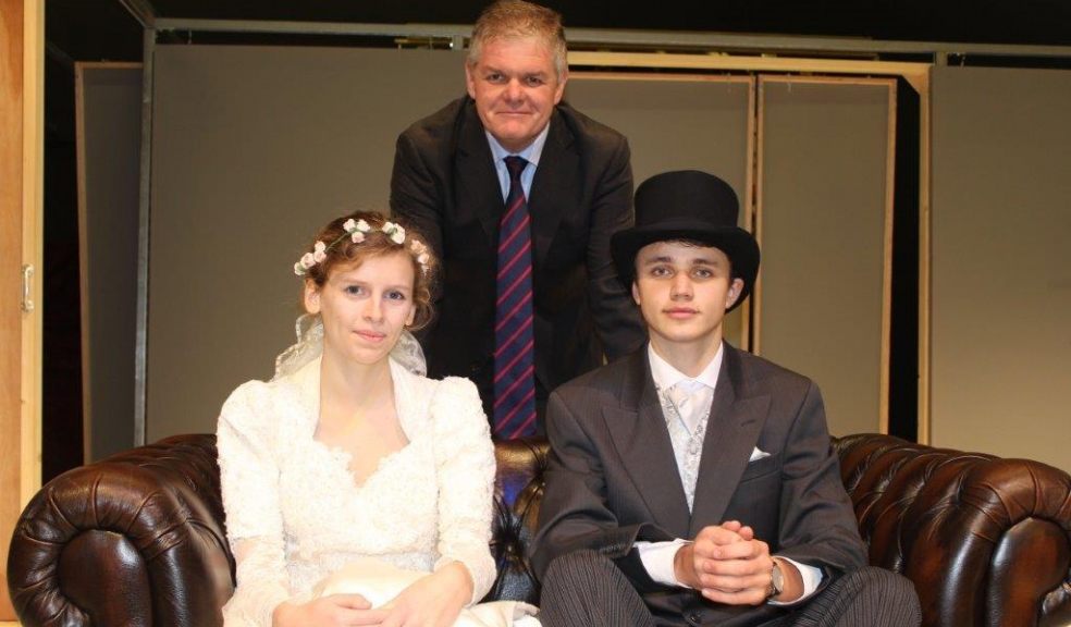 Headmaster Mr Griffin with the leads in the Exeter School production of ‘An Italian Straw Hat’, Freya Houghton and Freddie Crowley