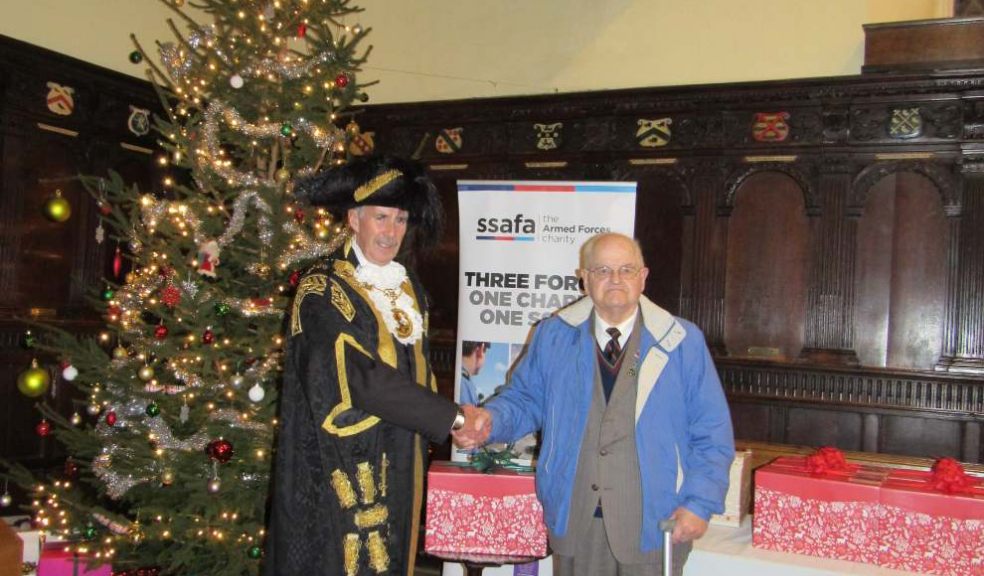 Lord Mayor Councillor Peter Holland presenting Dennis Colin Williamson with his hamper.