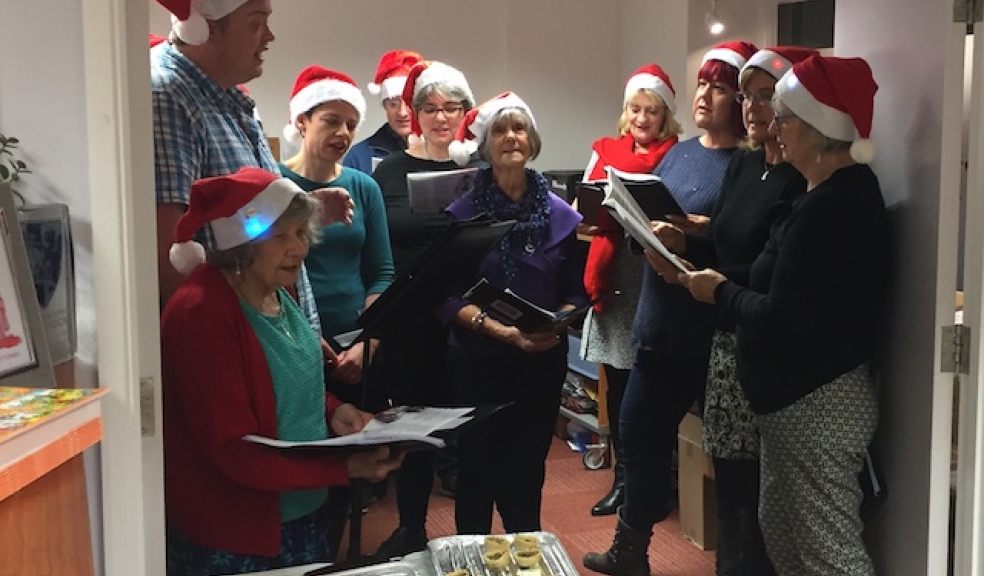 Singers from the Big Noise Choir at the Cartridges Law office