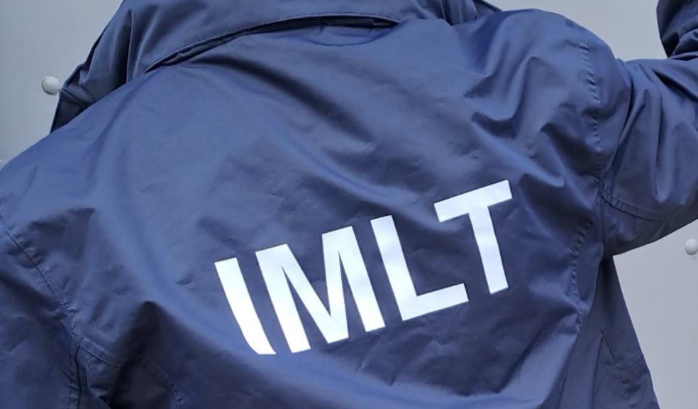 An IMLT officer.
