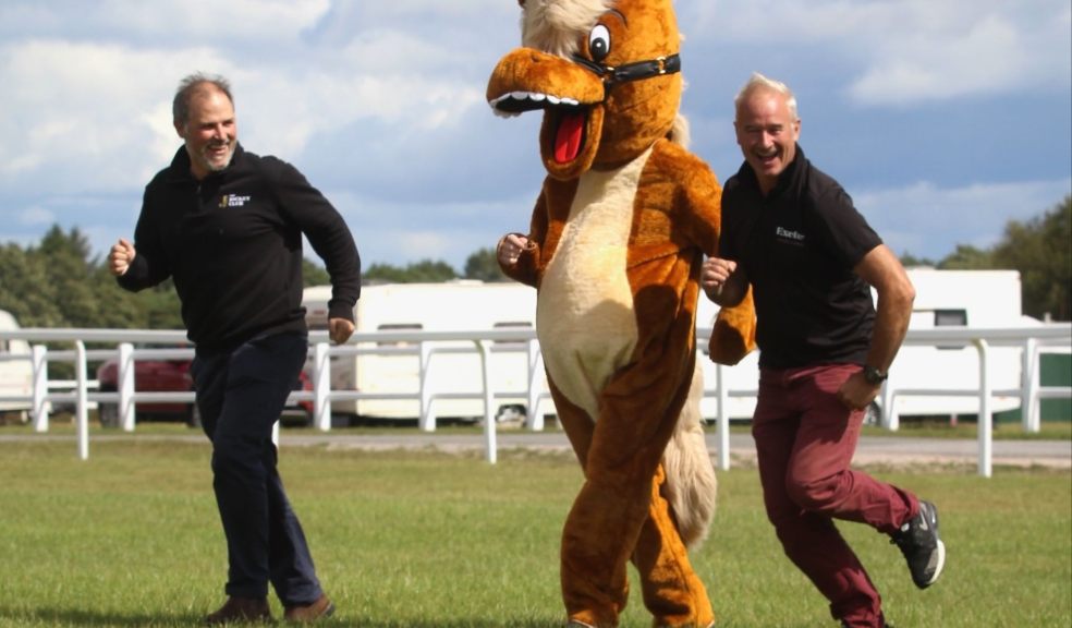 Jack Parkinson, Dexter and Jason Loosemoore limber up at Exeter Racecourse. Photo: Exeter Racecourse.