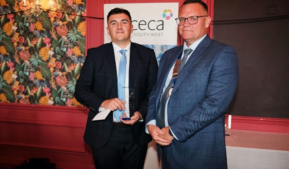 Phil Ramsden, Chair, CECA (South West), presenting the award to James Rush (left).