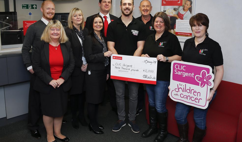 Sam Abrahams, Claire Colman and Frank Tiley from La La Choirs presenting a cheque for £12,000 for Jordan Anderton from CLIC Sargent with the staff of the Exmouth branch of Santander