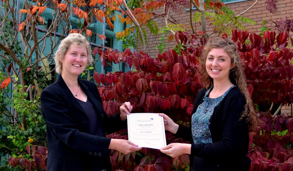 Joanna Damerell presenting Kelly Newman with her award