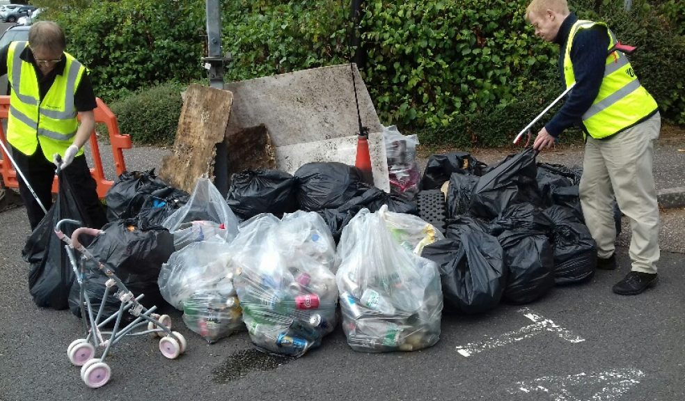 Litter pickers with some of the rubbish collected in an hour