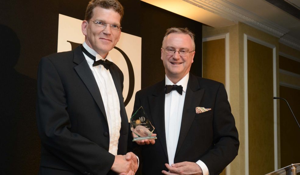 Rob Varley, left, of the Met Office, receiving his IoD South West 2012 Director of the Year Awards trophy from IoD chairman Ian Dormer. Rob won the Public Sector Director category