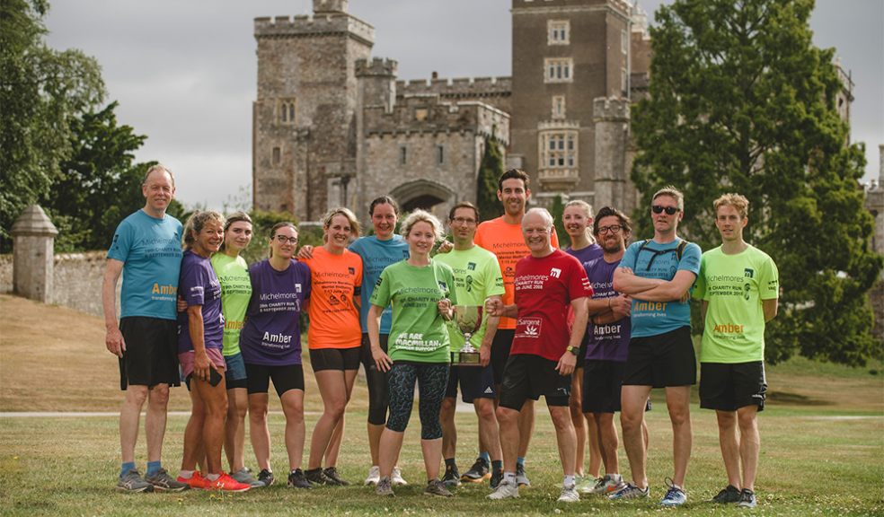 Michelmores team at powderham castle after completing the relay
