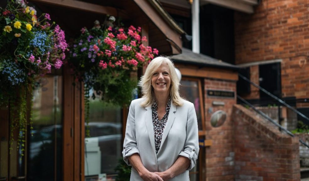 Margot Whittaker outside The Old Rectory care home