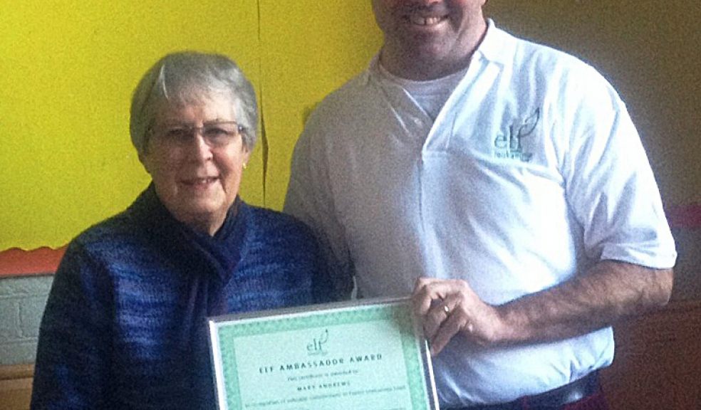 1. Dale Edwards , CEO ELF, presenting the award to Mary Andrews