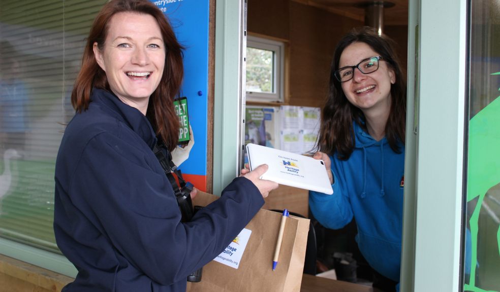 Maryann Soper from Heritage Ability delivering the tablet to Seaton Wetlands