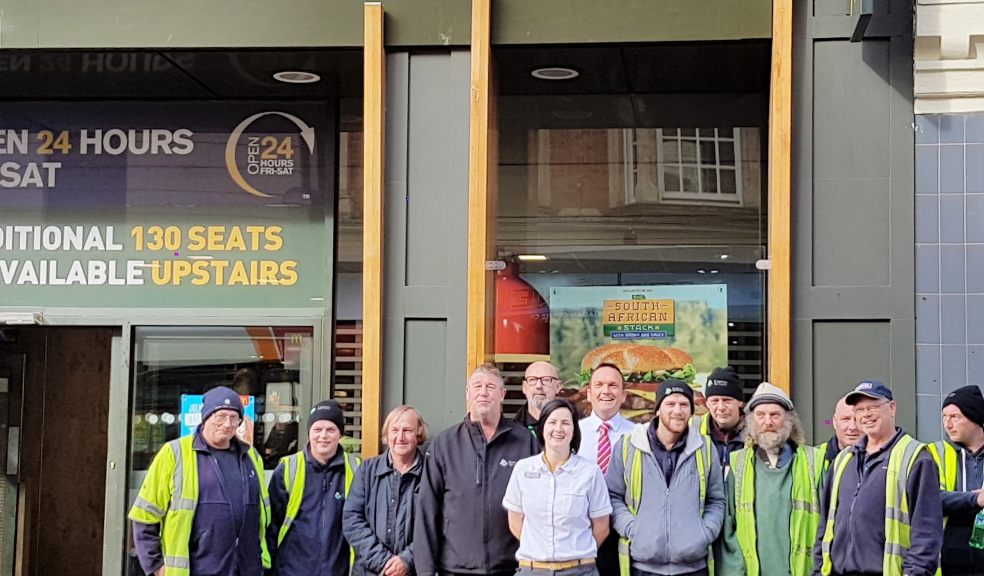 Local outdoor workers with David outside his restaurant on the High Street