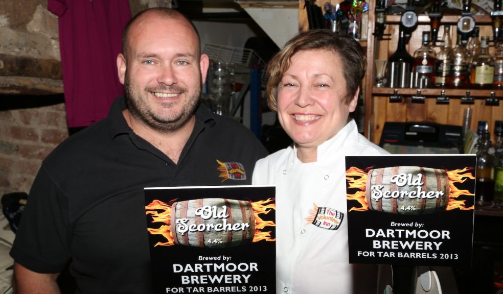 The Volunteer Inn owners Mike and Jacqui Downs welcome Dartmoor Brewery's Old Scorcher ahead of the Ottery Tar Barrels event