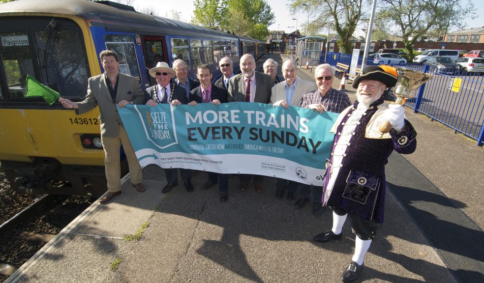 Cllr Andrew Leadbetter, left, waving off the new Sunday Service with Deputy Mayor for Exmouth Cllr Brian Cole, GWR Driver Competence Manager Paul Samways, Driver Competence Manager, Chair of ALRUG Mike Reddaway, ALRUG Committee members, and Roger Bourgein, Exmouth Town Crier.