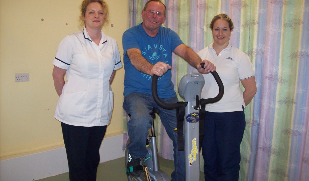 L-R: physiotherapist Louise Tucker (Community Reablement Team) with patient Mike Johnson and Physiotherapist Natalie Sansom (Musculoskeletal Outpatients).