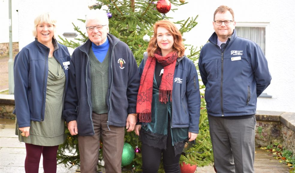 People and christmas tree