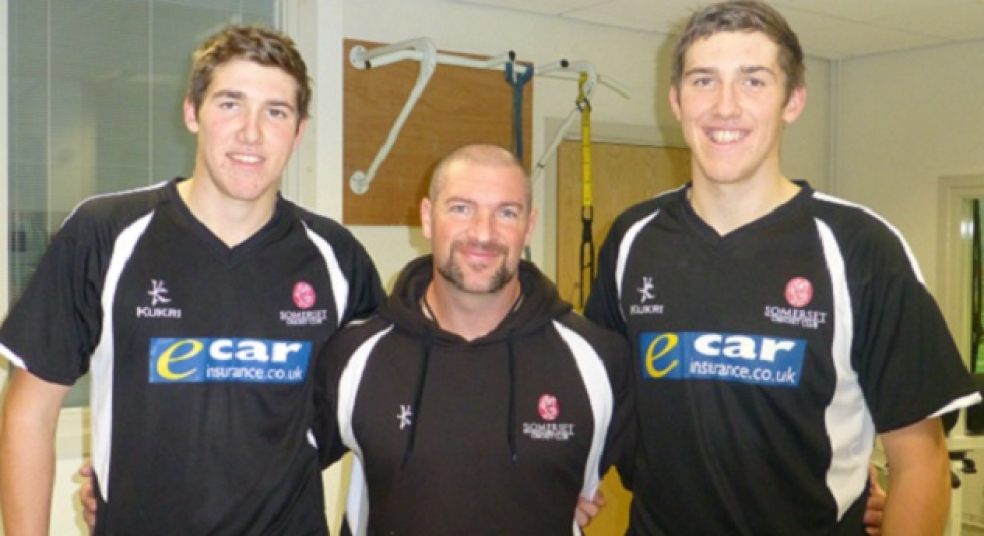 Jamie (left) and Craig Overton are pictured with Darren Veness at the County Ground in Taunton