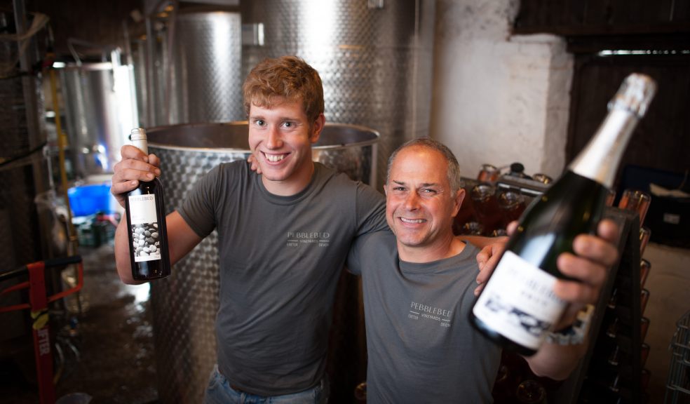 Pebblebed wine maker Alex Mills (left) with owner Geoff Bowen and their award winning sparkling wine.