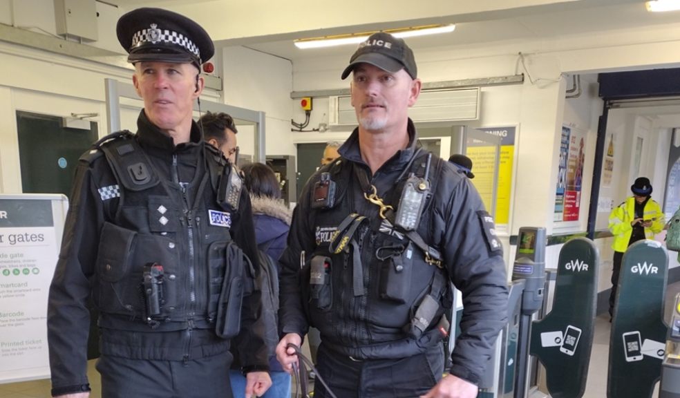 Insp Simon Arliss (left) with sniffer dog Skye and handler PC Steve Waters