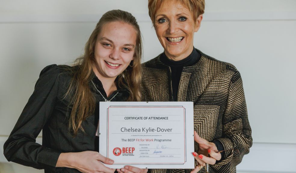 Chelsea Kylie-Dover receiving her certificate from Judi Spiers
