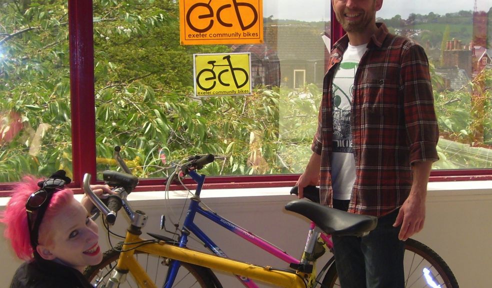 Jola Pawlikowski and mechanic Andy Richardson in Exeter Community Bikes new workshop in the Harlequin Centre