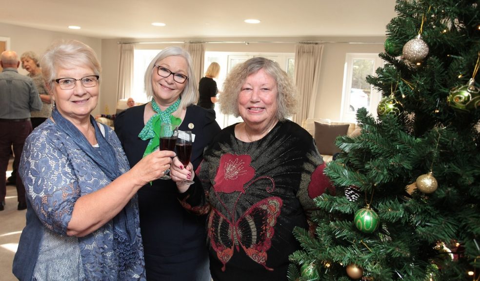 Pinnoc Mews residents with McCarthy and Stone Sales Consultant, Yvonne Sene, enjoying the Christmas event at Pinnoc Mews