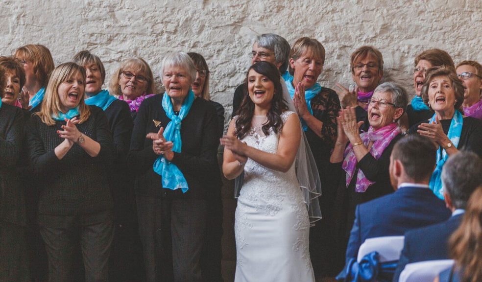 Rachel singing with the Hospiscare Choir at her wedding