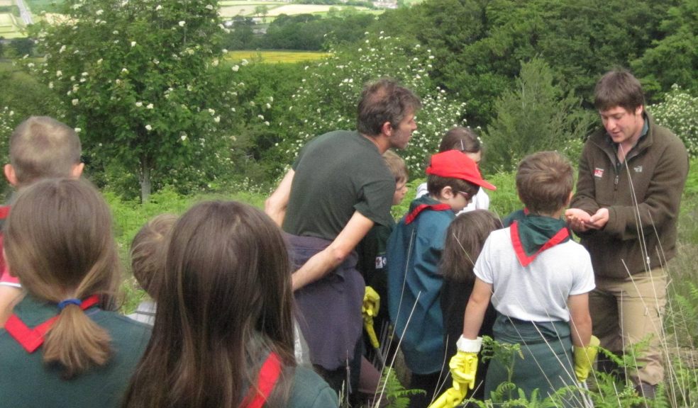 Ranger Jim Hunter shows a slow worm to the group