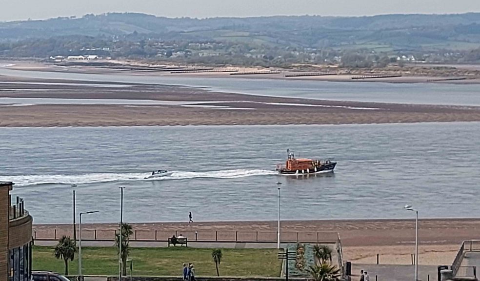 Exmouth RNLI lifesavers tow the speedboat to safety