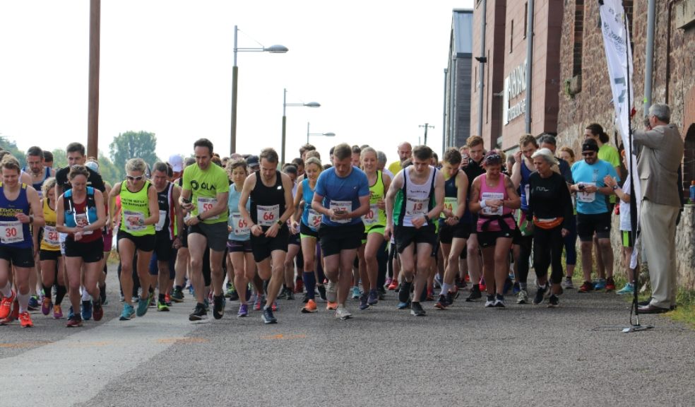 Marathon runners get ready to race at Exeter Quayside