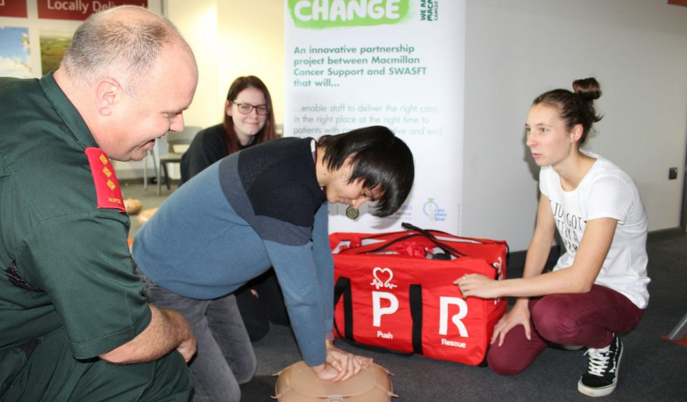 South Devon UTC students Jemima May (17), Aggie Purser-Mountford (17) and Abe Sriwatcharaporn (18) get hands-on learning how to perform CPR and what steps to take in a critical, life-threatening situations, watched on by Jonathan Bradley, Cancer Care Facilitator (Dorset, Devon and Somerset),South Western Ambulance Service NHS Foundation Trust