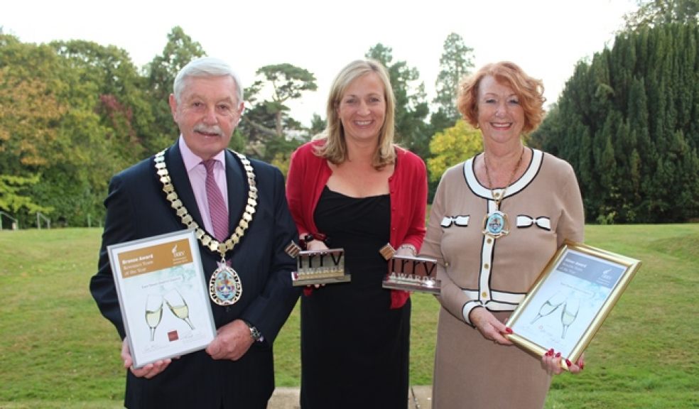 Picture shows team manager Libby Jarrett (centre) with Council Chairman Graham Godbeer and Vice Chairman Christine Drew.