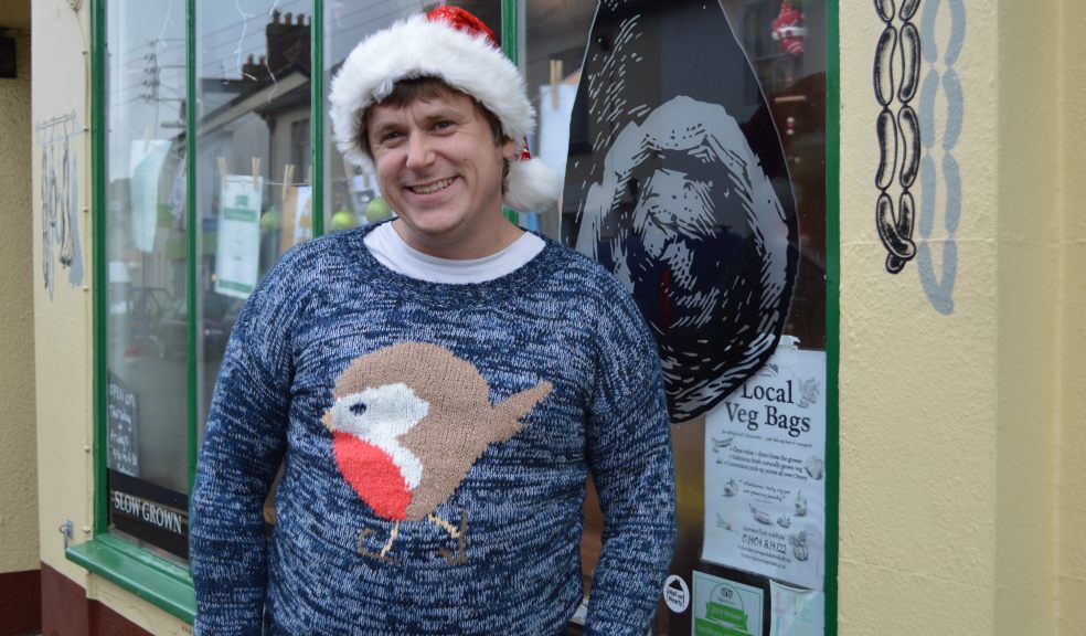 Robin Rea models his Christmas jumper