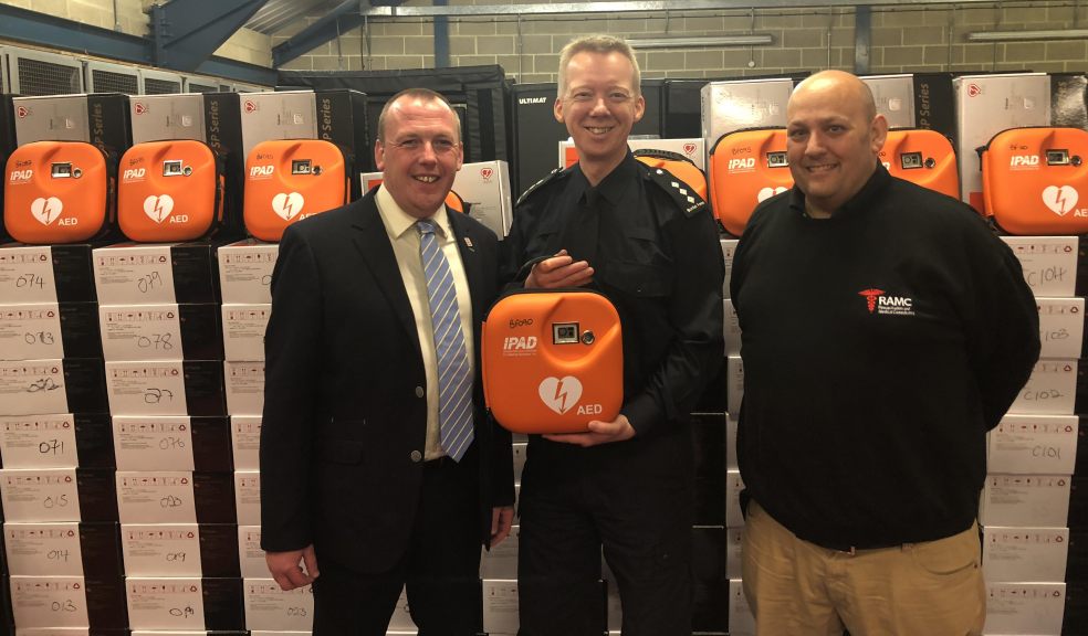 Paul Watts (left), Head of International Business Development at SP Services, which supplied 110 defibrillators to Border Force with resuscitation expert Stephen Furnell and Border Force Senior Officer Neil Dangerfield.