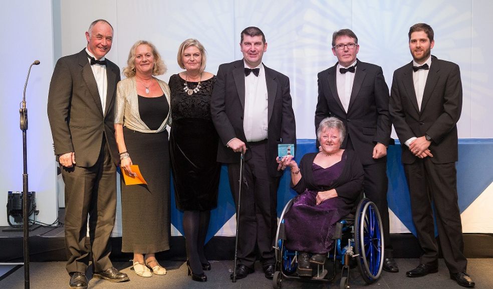 Representatives from Countryside Mobility with their South West Tourism Bronze Award for Access for All