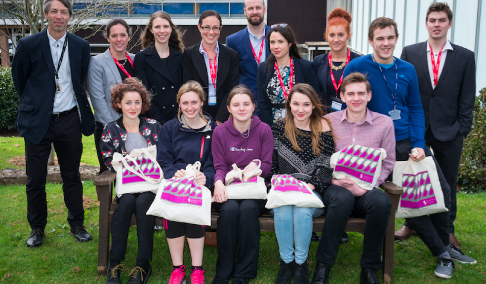 Students and representatives of Stephens Scown outside Exeter College, before the debate. From left, back row: Martin Owen, Exeter College; Natalie Talbot, Harriet Wigmore, Thea Bennun, Ed Fowler, Beth Johnson, Phillippa Wegg, all Stephens Scown; Tyler Hillier, a student at Exeter College. Front row seated, from left: Tilly Porter, Caitlin Naylor, Ellen Bradridge, Abbie McGregor and James Craig, all of Exeter College.