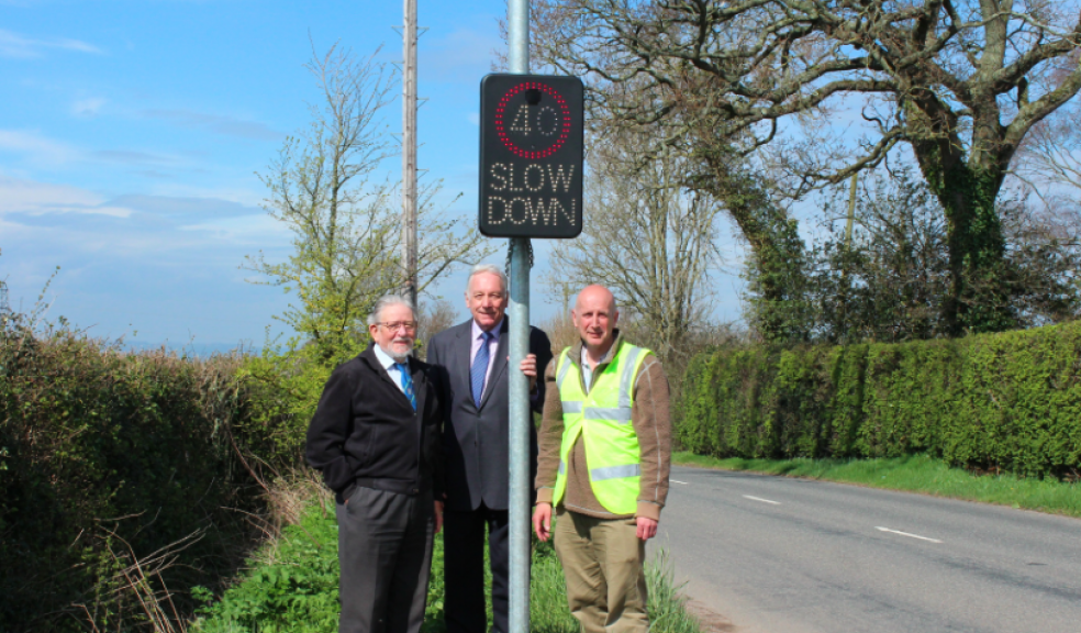 Woodbury speed sign left to right - Cllr Bernard Hughes (DCC), Cllr Tom Wright (EDDC), Cllr Tim Pattison (Woodbury PC)