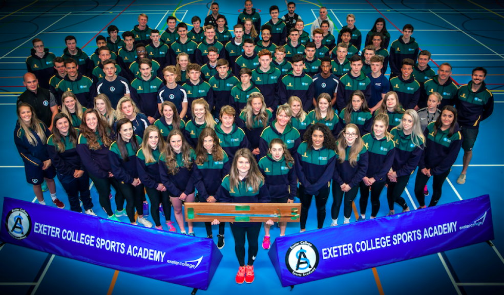 Celebrating success: The Exeter College sports squad who played their part in the South West being named winners of the Association of Colleges Sport National Championships, pictured with the Wilkinson Sword.
