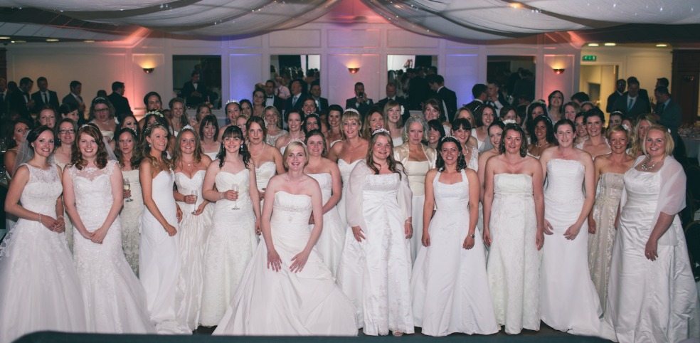 Guests at the Ball, dressed in their finest wedding attire.