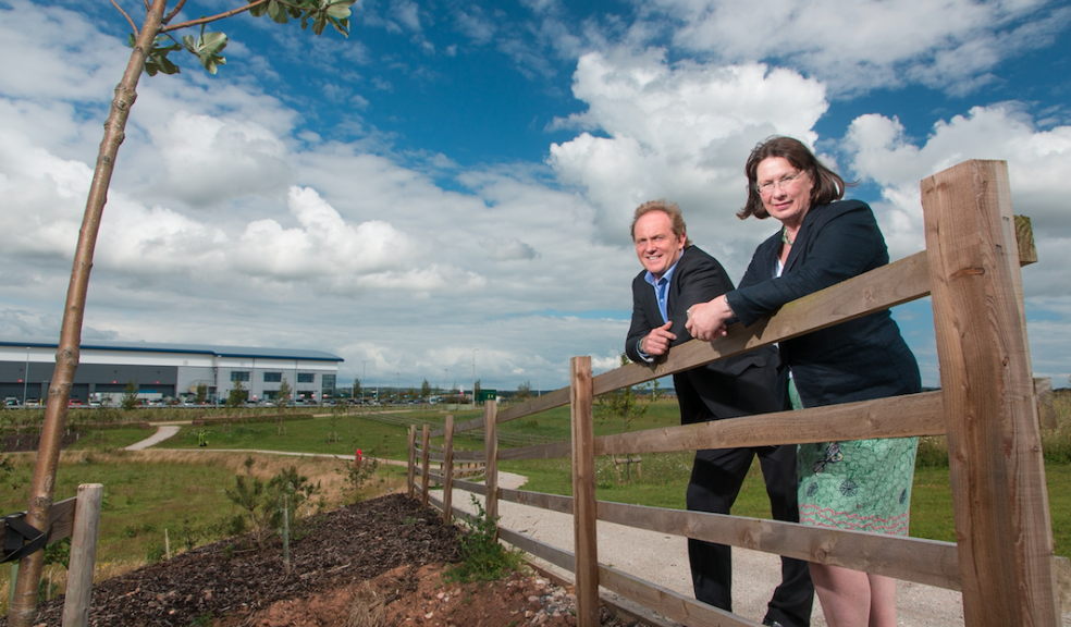 Senior Development Manager at St. Modwen, Ian Guy and Council Chairman of Clyst Honiton Parish Council, Councillor Lynne Askew marking the opening.