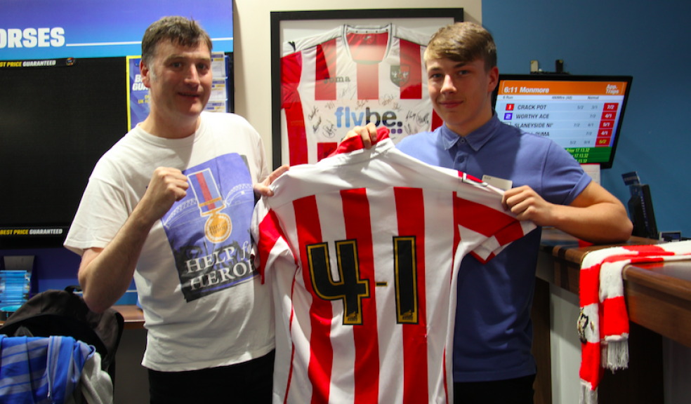Roger Hamilton-Kendall (left) with Alex Gibbins at the Coral shop in Sidwell Street where he placed his bet on Saturday