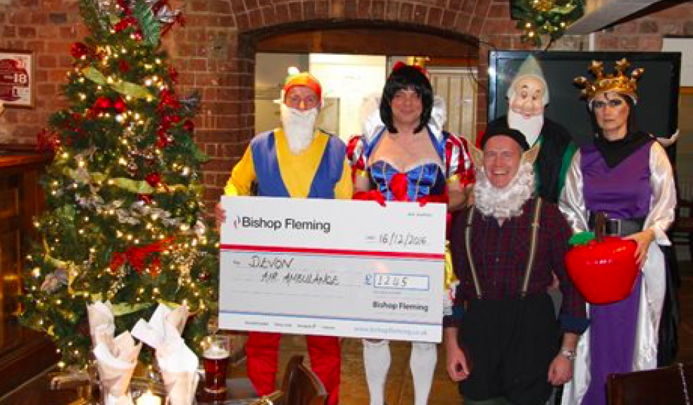 Snow White and the Seven Dwarfs (and the Evil Queen): Bishop Fleming Partners from L-R: Jerry O'Sullivan, Andrew Browne, James Finnegan, David Savill and Caroline Smale.