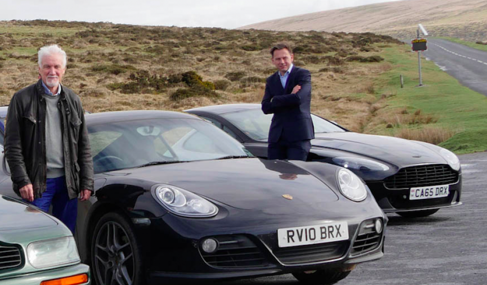 Roger (left) and Mark admire the car collection, generously loaned by local supporters