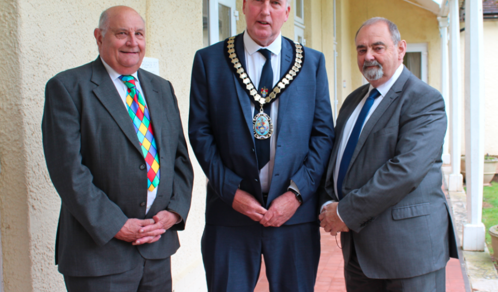 Pictured are, from left, David Atkins, Cllr Stuart Hughes (retiring chairman of East Devon District Council) and Peter Bowden.